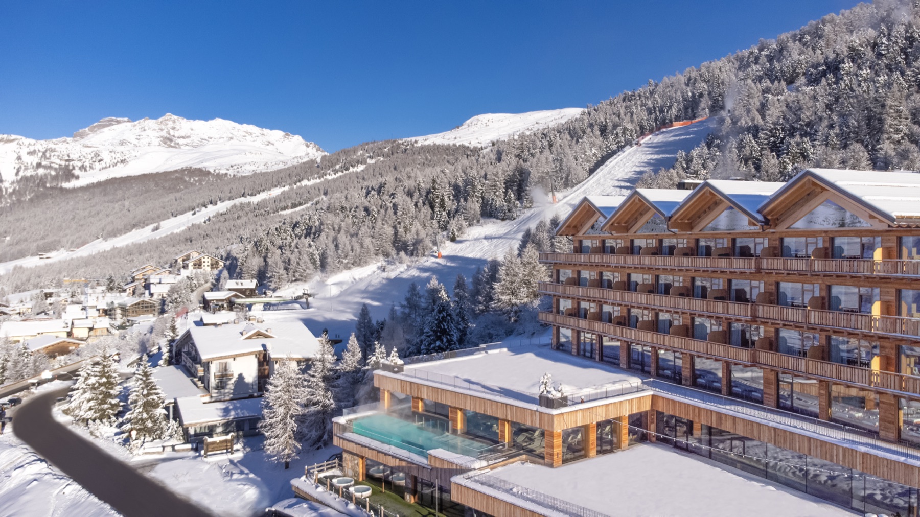 Alpen Resort surrounded by snowy mountains